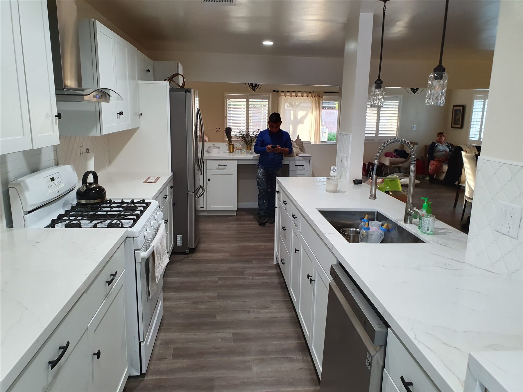 Bright completed kitchen with white finishes